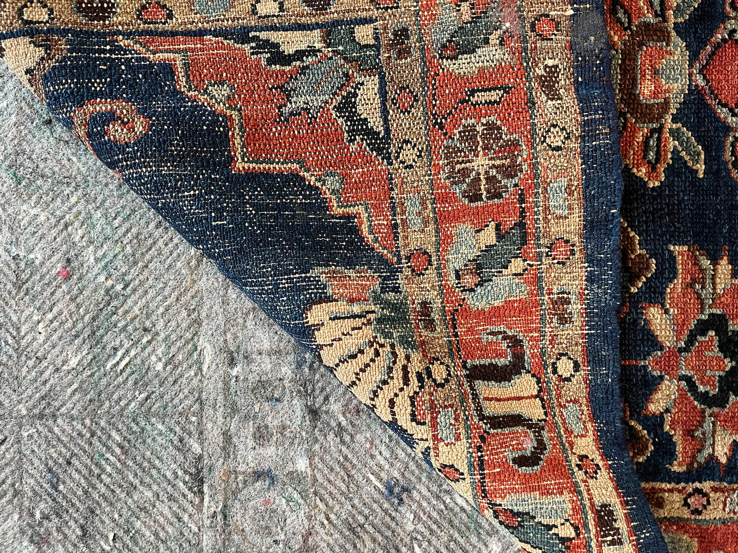 True Antique Hand-Knotted Persian Rug including about the best underlayment pad money can buy-cut to order