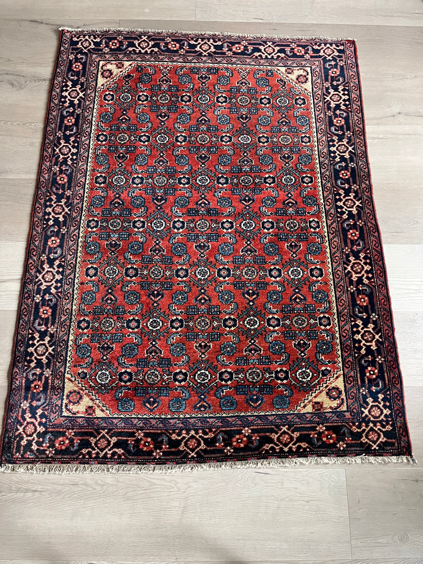 Genuine Antique Persian rug, circa mid-1920s.